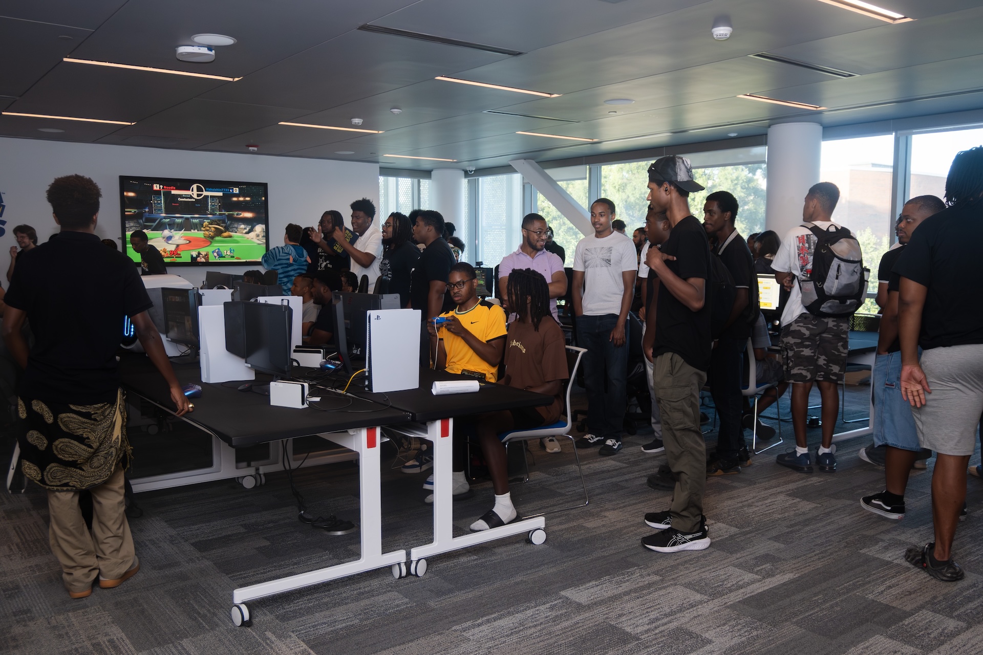 Student watching esports tournament in Aggie Esports Lab